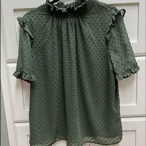 Women’s blouse with puff sleeves.